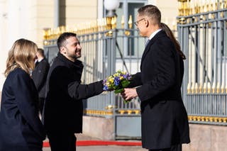 Finland's president Alexander Stubb greets Mr Zelensky